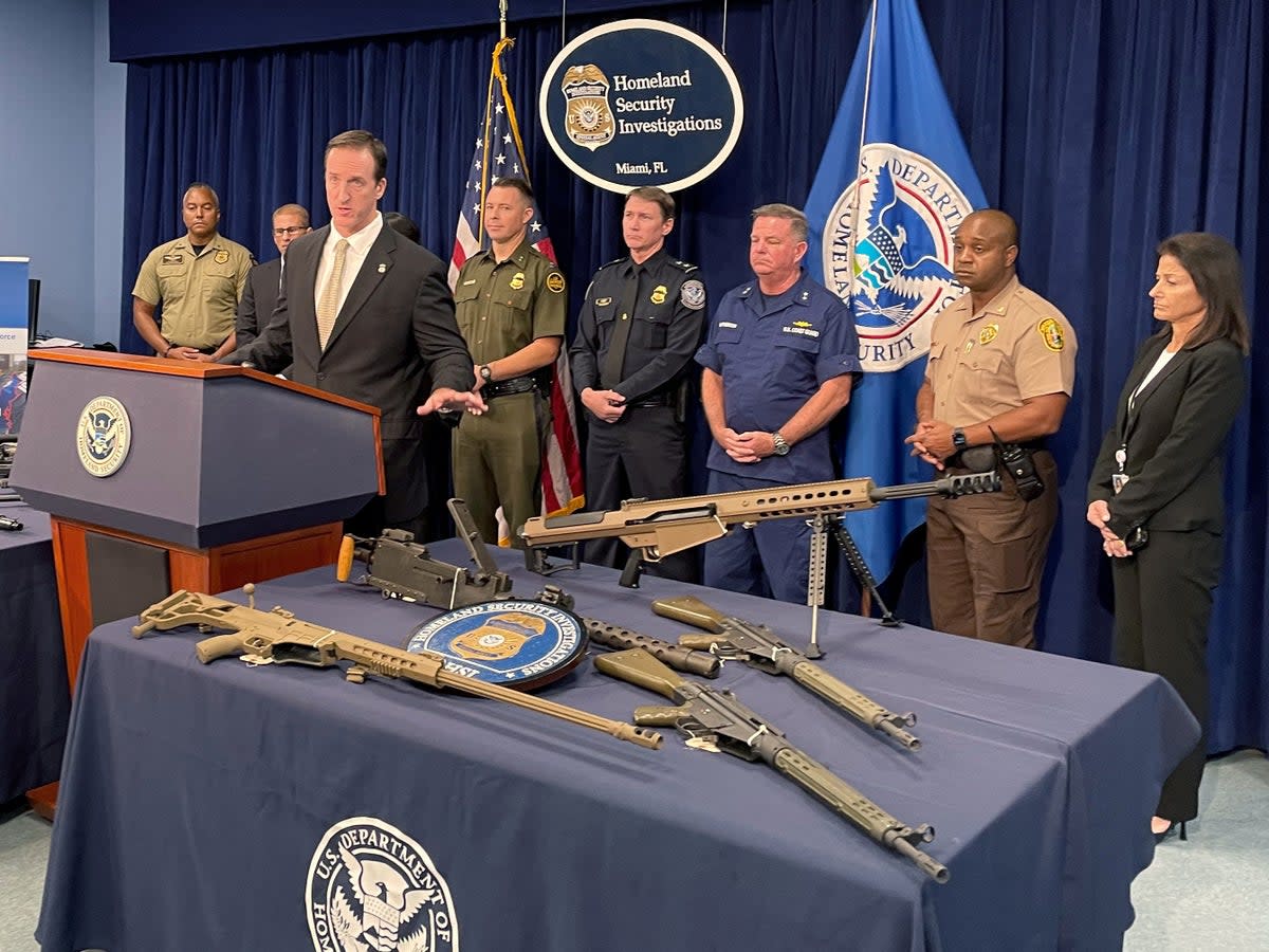 Anthony Salisbury, Special Agent in Charge of Homeland Security Investigations Miami speaks as weapons seized by U.S. authorities that had been destined for illegal export to Haiti are displayed at a news conference in Miami, Florida (REUTERS)