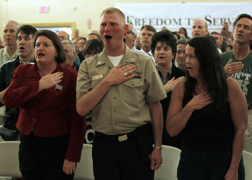 Members of the U.S. military celebrate the expiration of the U.S. military policy "Don't Ask Don't Tell" at the San Diego LGBT community center