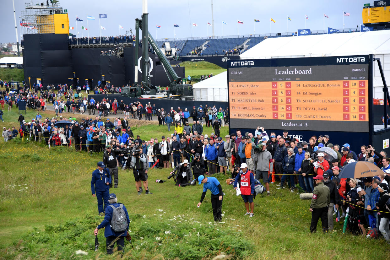 Rory takes his free drop. (Getty)