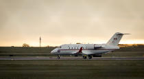 A Canadian Forces Challenger jet takes off from the Calgary International Airport in Calgary after two Canadians who were imprisoned in China for nearly three years returned, , Saturday, Sept. 25, 2021. Video from CTV shows Prime Minister Justin Trudeau greeting Michael Kovrig and Michael Spavor on the tarmac at the airport in Calgary early this morning. (Jeff McIntosh/The Canadian Press via AP)