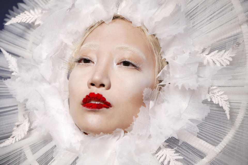 Jean Paul Gaultier: Icicle eyelashes and feathery red lips