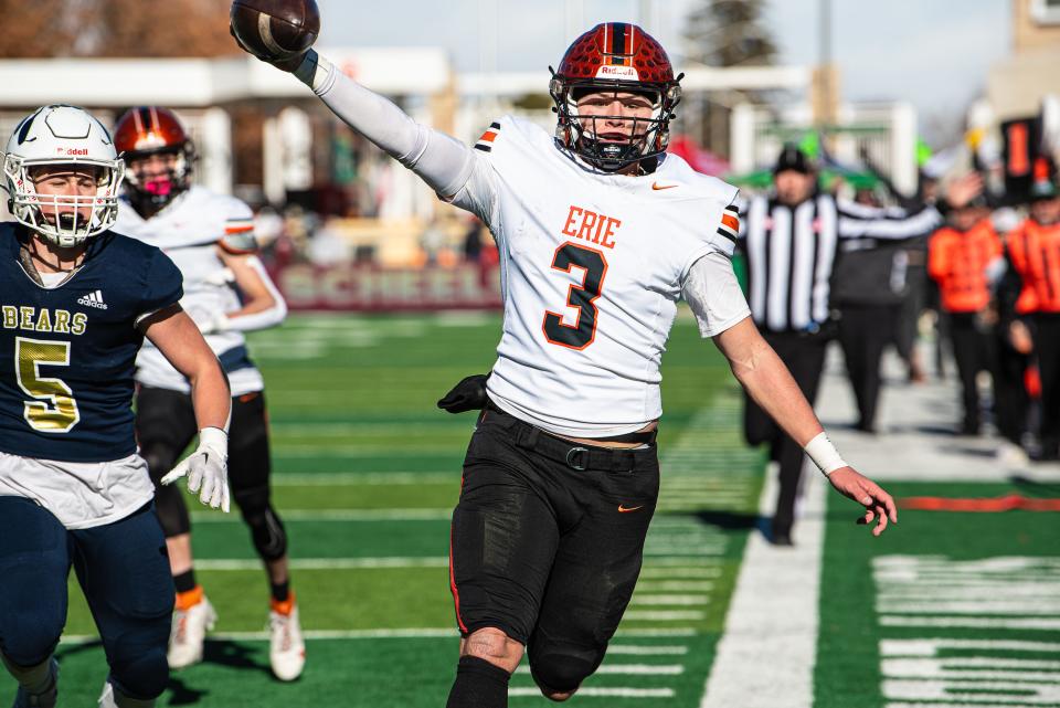 Erie quarterback Blake Barnett (3) tiptoes along the sidelines during the Tigers' 4A state championship game win over Palmer Ridge on Dec. 2 at Canvas Stadium in Fort Collins.