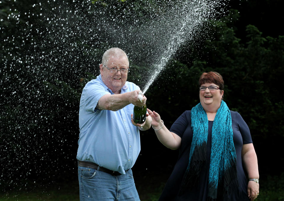 Colin and Chris Weir, from Largs in Ayrshire, celebrate during a photo call at the Macdonald Inchyra Hotel & Spa in Falkirk, after they scooped £161 million in Tuesday's EuroMillions draw.