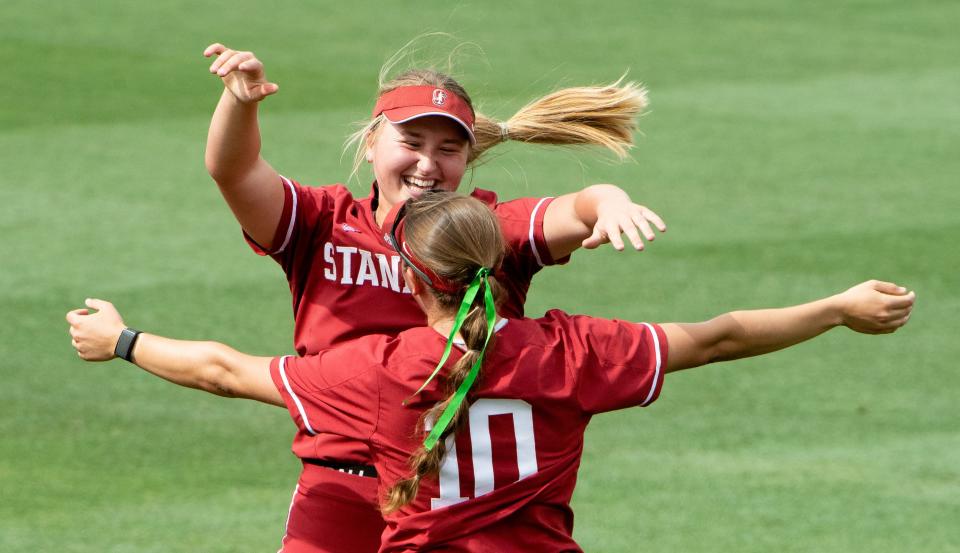 May 22, 2022; Tuscaloosa, AL, USA; The Stanford Cardinal defeated the Alabama Crimson Tide 6-0 to claim the NCAA Tuscaloosa Regional title Sunday. Stanford pitcher Regan Krause (6) and Stanford outfielder Hannah Matteson (10) celebrate after the victory. Mandatory Credit: Gary Cosby Jr.-The Tuscaloosa News