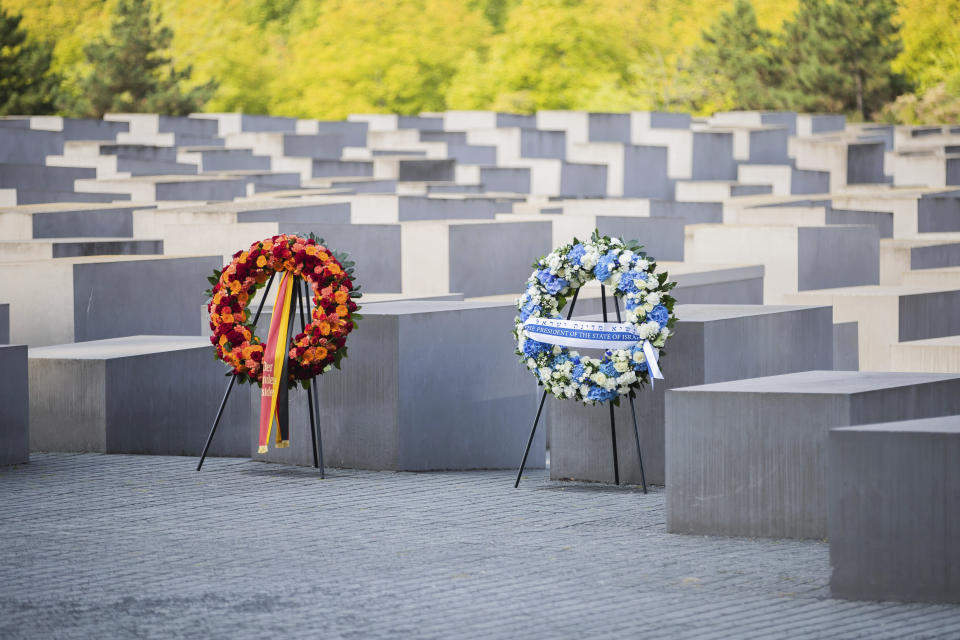 Wreaths are seen at the Holocaust memorial before the arrival of Israeli President Isaac Herzog and German President Frank-Walter Steinmeier to a wreath laying ceremony in Berlin, Germany, Tuesday, Sept. 6, 2022. (AP Photo/Christoph Soeder)