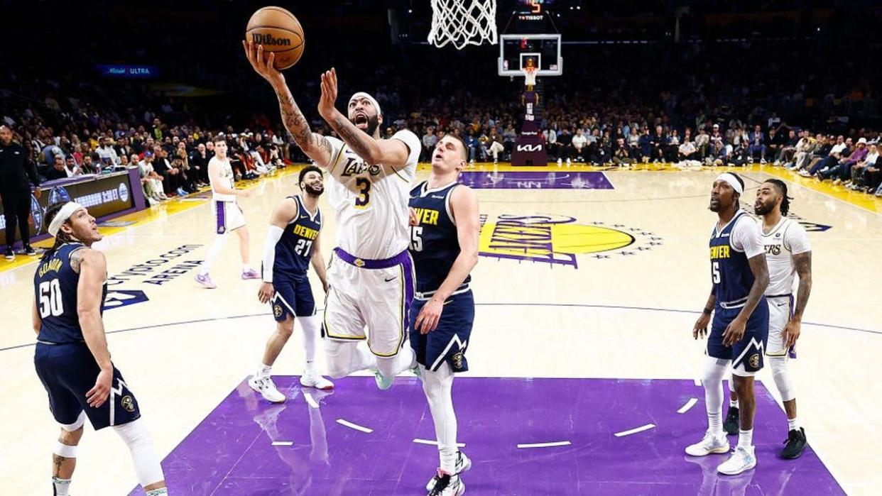 <div>Anthony Davis #3 of the Los Angeles Lakers takes a shot against Nikola Jokic #15 of the Denver Nuggets. (Photo by Ronald Martinez/Getty Images)</div> <strong>(Getty Images)</strong>