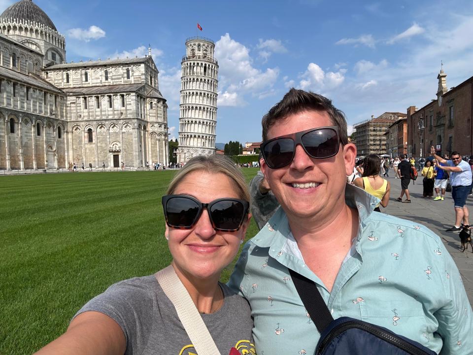 The author and husband in front of the Leaning Tower of Pisa