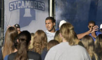 Indiana State NCAA college football player Dante Hendrix speaks during a vigil on Sunday, Aug. 21, 2022, at Memorial Stadium in Terre Haute, Ind. Two of their teammates were killed in a single-car accident and two others were hospitalized with serious injuries earlier in the day. (Joseph C. Garza/The Tribune-Star via AP)