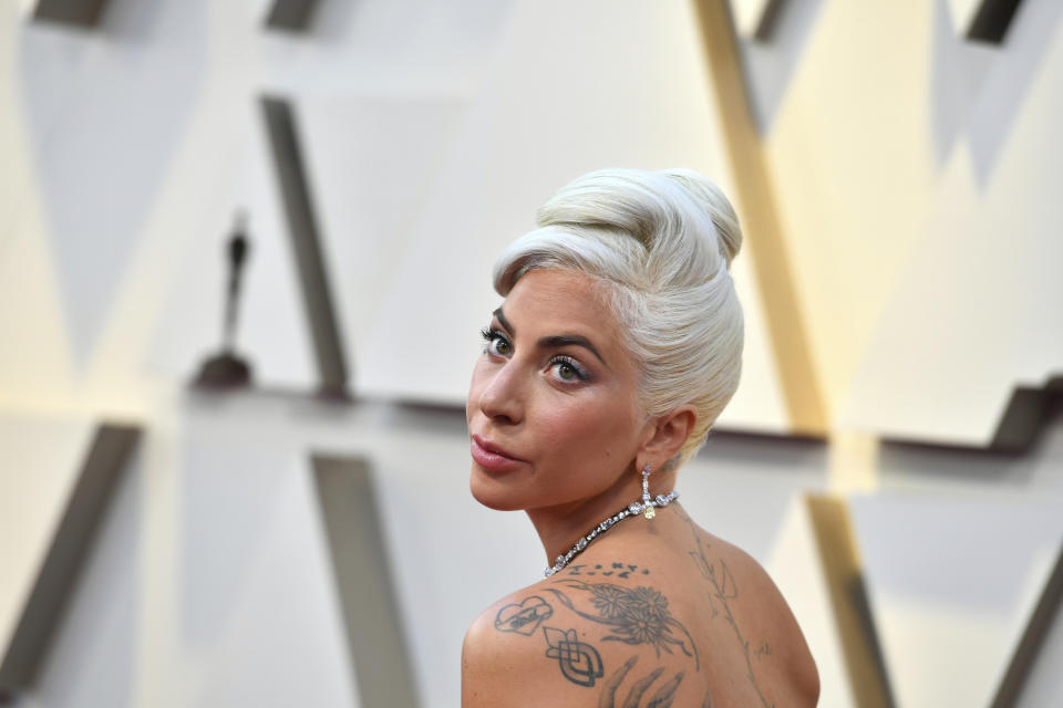 FILE - In this Feb. 24, 2019 file photo, Lady Gaga arrives at the Oscars at the Dolby Theatre in Los Angeles. Billionaire investor William Ackman is setting his sights on the music industry, as his blank check company confirms it is in talks to buy a 10% stake of Universal Music Group for about $4 billion. French media company Vivendi, which owns Universal Music, also confirmed the discussions on Friday, June 4, 2021. (Photo by Jordan Strauss/Invision/AP, File)