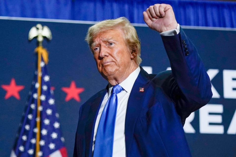 Former President Donald Trump gestures after speaking at a campaign rally Oct. 23, 2023, in Derry, New Hampshire.