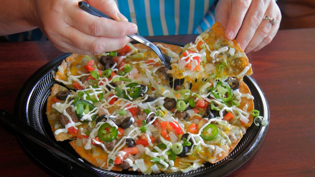 <div>A Mexican style pizza from Tex-Mex food in Tijuana Flats. (Photo by: Jeffrey Greenberg/Universal Images Group via Getty Images)</div>