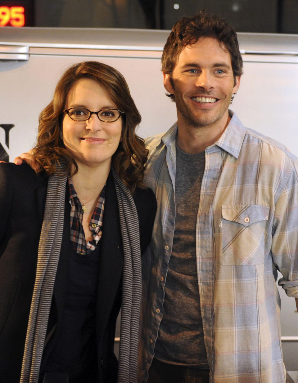 This undated image released by NBC shows James Marsden as Criss, right, and Tina Fey as Liz Lemon in a scene from "30 Rock." The characters will wed on the “30 Rock” episode that airs Nov. 29. (AP Photo/NBC, Ali Goldstein)