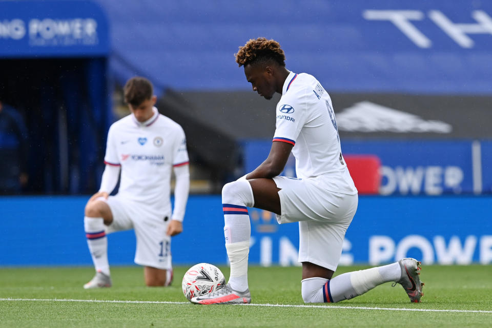 LEICESTER, ENGLAND - JUNE 28: Tammy Abraham of Chelsea takes a knee in support of the Black Lives Matter movement during the FA Cup Fifth Quarter Final match between Leicester City and Chelsea FC at The King Power Stadium on June 28, 2020 in Leicester, England. (Photo by Darren Walsh/Chelsea FC via Getty Images)