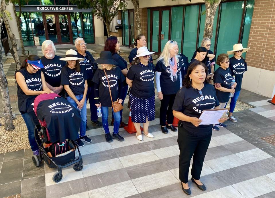 Irene Armendariz-Jackson is surrounded by supporters in front of City Hall on Friday, Sept. 8, 2023, before filing her notice of intent to recall city Rep. Cassandra Hernandez. The group now has 60 days to collect the signatures needed to bring the recall before voters.