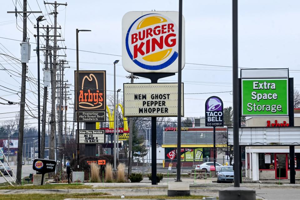 An assortment of fast food restaurants and a storage facility are the businesses on Martin Luther King Jr. Boulevard near Holmes Road on Tuesday, Dec. 13, 2022, Lansing.