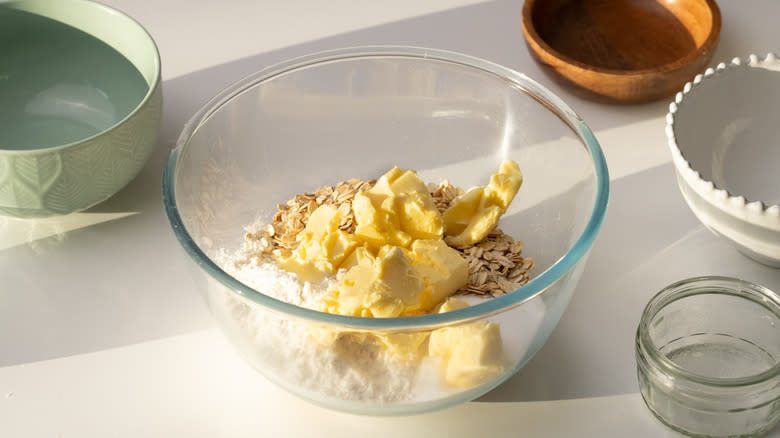 butter and dry ingredients in a bowl