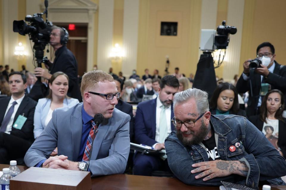 Stephen Ayres (L), who entered the U.S. Capitol illegally on January 6, 2021, confers with Jason Van Tatenhove (R), who served as national spokesman for the Oath Keepers (Getty Images)