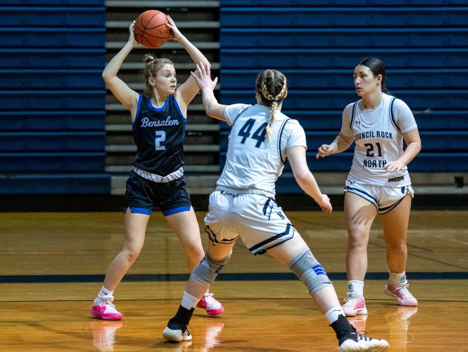 Council Rock North's Ruth O'Keefe (44) and Delaney McCaffery (21) try to block a pass from Bensalem's Talia DiMichele (2) during their girls' basketball game in Newtown on Friday, Jan. 26, 2024.

Daniella Heminghaus | Bucks County Courier Times