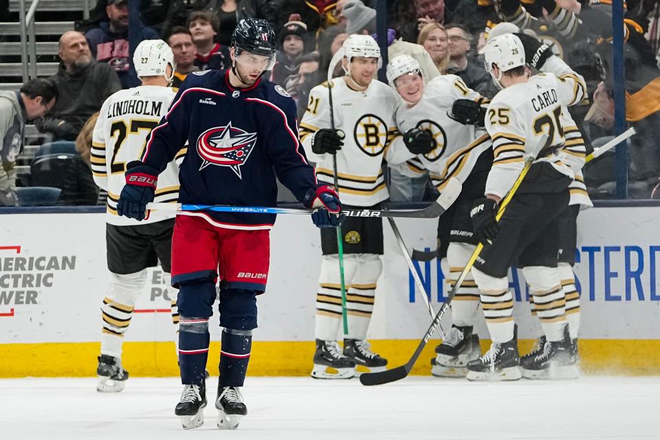 Jan 2, 2024; Columbus, Ohio, USA; Columbus Blue Jackets center Adam Fantilli (11) reacts to a goal by Boston Bruins center Trent Frederic (11) during the third period of the NHL hockey game at Nationwide Arena. The Blue Jackets lost 4-1.