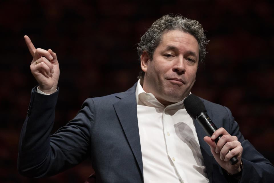 Gustavo Dudamel is introduced as the New York Philharmonic's 27th music and artistic director, Monday, Feb. 20, 2023, in the newly renovated David Geffen Hall at Lincoln Center for the Performing Arts in New York. (AP Photo/John Minchillo)