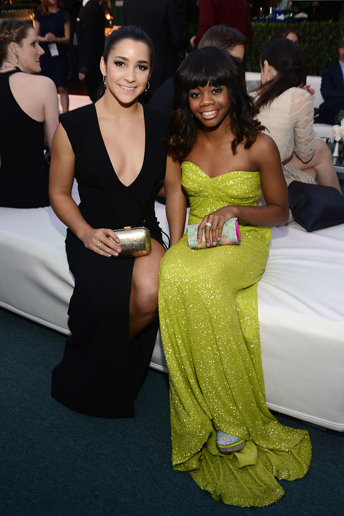 Olympic gold medalists Aly Raisman and Gabrielle Douglas attend the NBCUniversal Golden Globes viewing and after party held at The Beverly Hilton Hotel on January 13, 2013 in Beverly Hills, California.