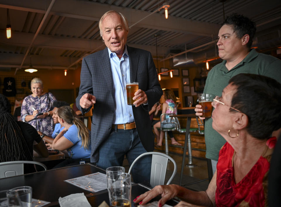 FILE:  Maryland Comptroller Peter Franchot, weighing a gubernatorial run, chats with customers at Denizens brewpub, in Silver Spring, MD.  / Credit: Bill O'Leary/The Washington Post via Getty Images