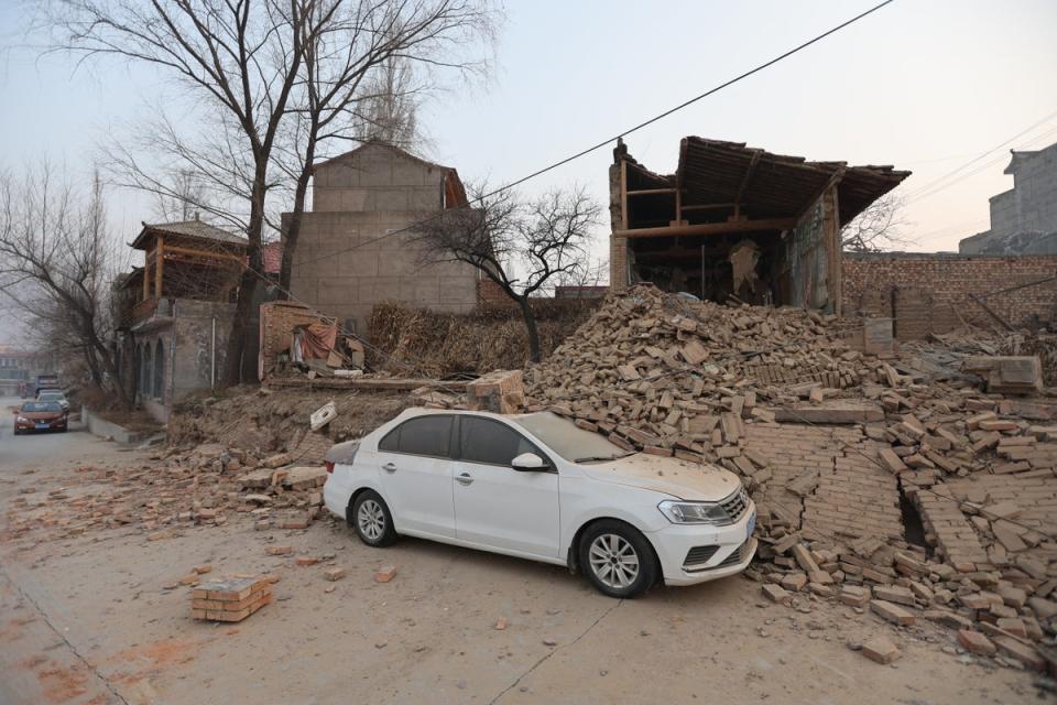 Collapsed buildings are seen after an earthquake in Dahejia (AFP via Getty Images)