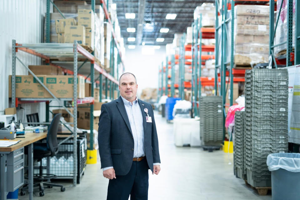 Brad Haupt, vice president of supply chain and contract management, at Monument Health's distribution center in Rapid City, S.D., where cases are on the rise. (Monument Health)
