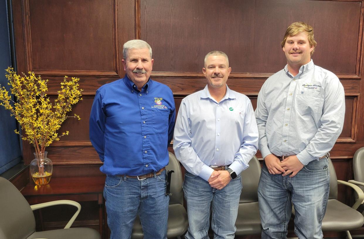 Danny Nixon (left), Scott Nixon (middle) and Camden Nixon (right) stand in the South Plains Electric Cooperative administration office at 4727 South Loop 289, as seen on Friday, Aug. 30, 2024.