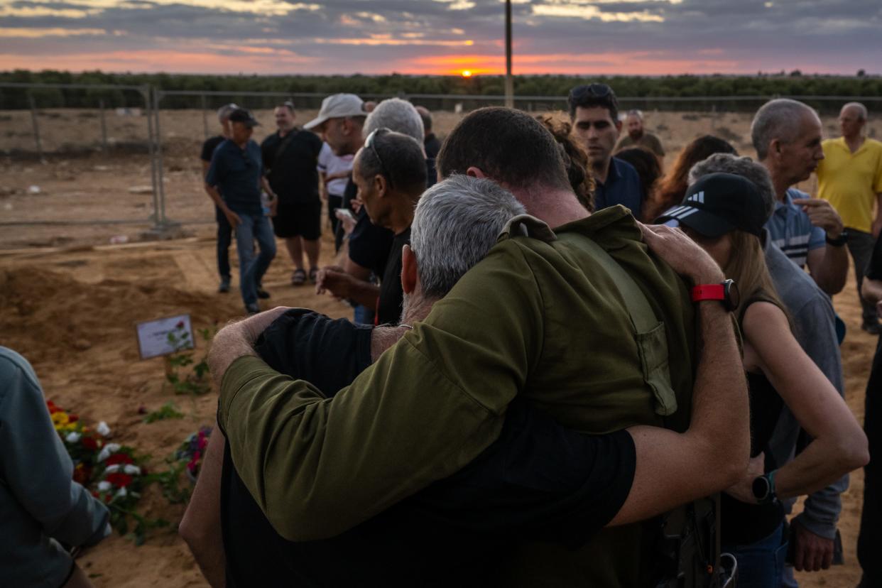 Mourners grieve for Liel Hetzroni , 12-years-old, and her aunt, Ila (Illios) Hetzroni who were killed at kibbutz Be'eri on October 7th by Hamas, during a funeral and farewell-ceremony at Kibbutz Revivim on November 15, 2023 in Revivim, Israel.