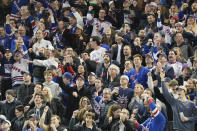 New York Rangers fans celebrate after a goal by center Mika Zibanejad during the second period of an NHL hockey game against the Montreal Canadiens, Sunday, April 7, 2024, at Madison Square Garden in New York. (AP Photo/Mary Altaffer)