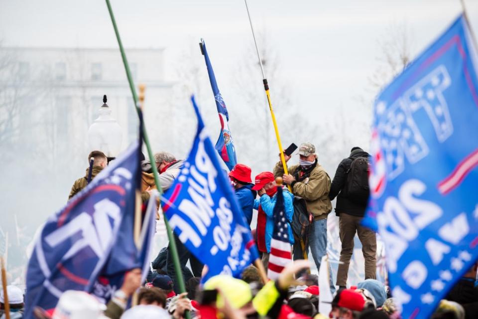 Many Virginians participated in the storming of the U.S. Capitol on Jan. 6. Gov. Ralph Northam sent Virginia National Guard members and 200 Virginia state troopers to D.C. to help quell the insurrection. (Don Cherry/Getty Images)