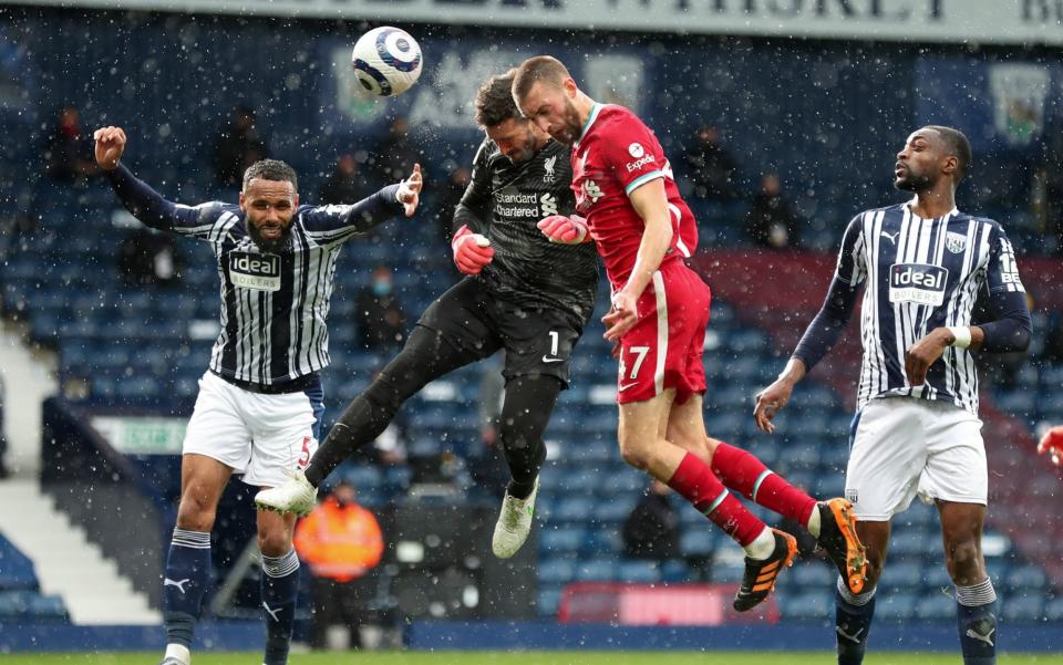 Alisson heads in at West Brom - GETTY IMAGES