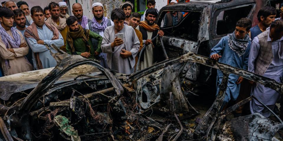 Afghans view aftermath of a US drone strike