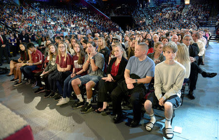 Marjory Stoneman Douglas High School students and parents wait for a CNN town hall meeting to begin, at the BB&T Center, in Sunrise, Florida, U.S. February 21, 2018. REUTERS/Michael Laughlin/Pool