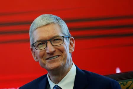 FILE PHOTO: Apple CEO Tim Cook attends the China Development Forum in Beijing, China March 18, 2017. REUTERS/Thomas Peter/File Photo