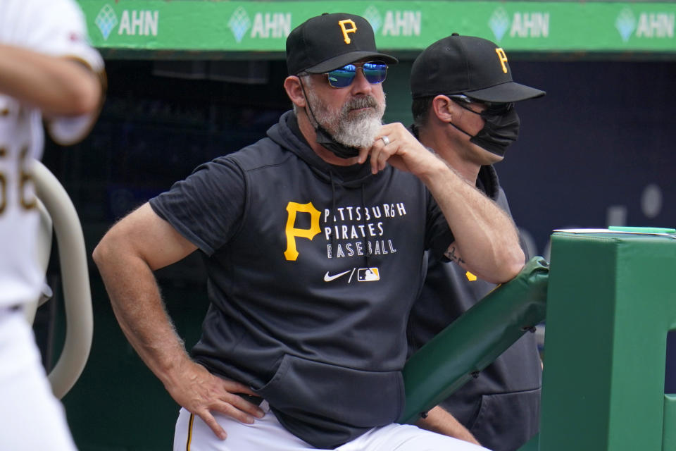 Pittsburgh Pirates manager Derek Shelton stands on the top of the dugout steps during a baseball game against the Los Angeles Dodgers in Pittsburgh, Thursday, June 10, 2021. (AP Photo/Gene J. Puskar)