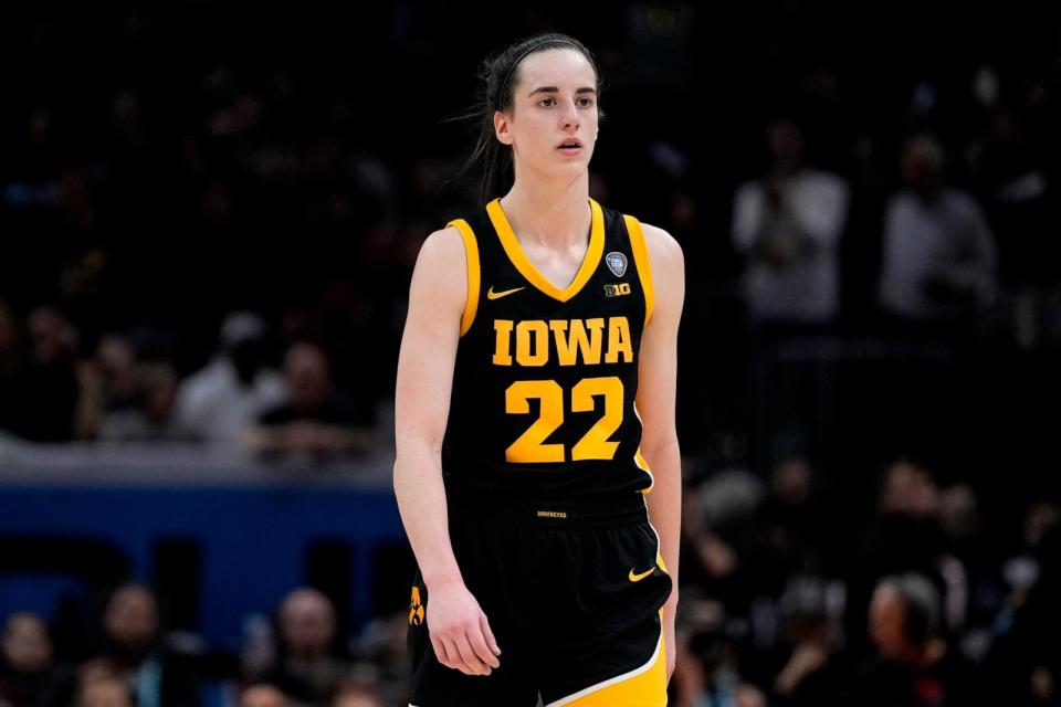 PHOTO: Iowa guard Caitlin Clark walks to the bench during the second half of the Final Four college basketball championship game against South Carolina in the women's NCAA Tournament, April 7, 2024, in Cleveland. (Morry Gash/AP)