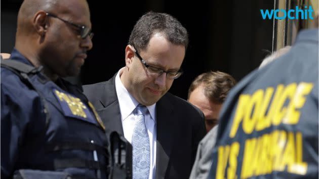 Jared Fogle with police. Photo: Supplied