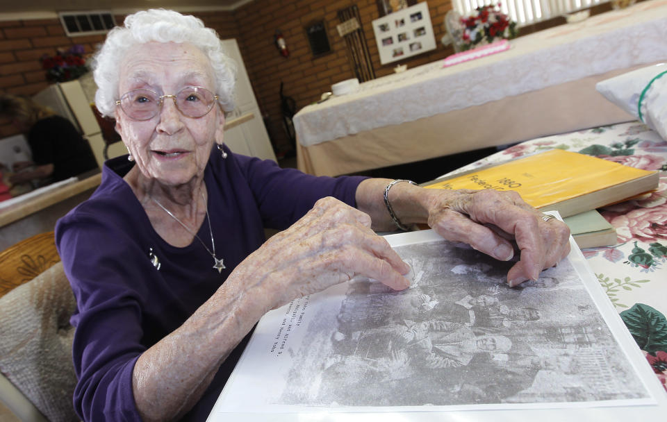 In this March 30, 2012, photo, Verla Morris, who will turn 100 later this year, goes through some of her family census data from the 19th and 20th centuries at her local residential senior center in Chandler, Ariz. When the 1940 census records are released Monday, April 2, Morris will see her own name and details about her life in the records being released after 72 years of confidentiality expires, allowing her to find out more about her family tree. (AP Photo/Ross D. Franklin)