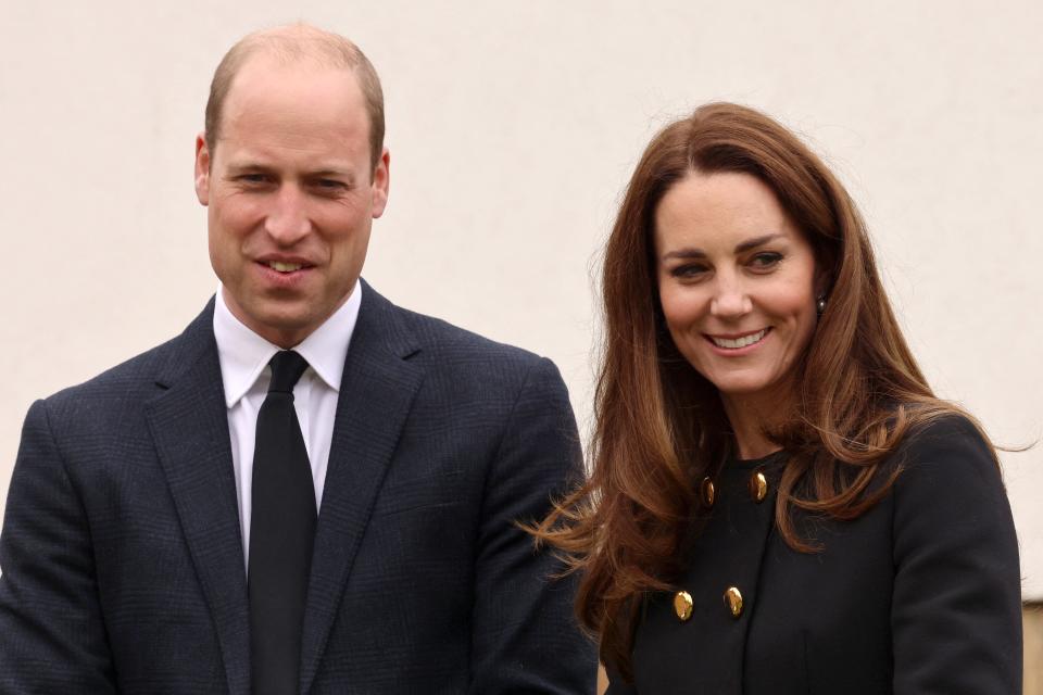 Britain's Prince William, Duke of Cambridge, and Britain's Catherine, Duchess of Cambridge, wearing black as a mark of respect following the death of Britain's Prince Philip, Duke of Edinburgh, meet air Cadets during their visit to 282 (East Ham) Squadron Air Training Corps in east London on April 21, 2021. - During the visit, the Squadron paid tribute to The Duke of Edinburgh, who served as Air Commodore-in-Chief of the Air Training Corps for 63 years. In 2015, The Duke passed the military patronage to The Duchess of Cambridge who became Honorary Air Commandant. (Photo by Ian Vogler / POOL / AFP) (Photo by IAN VOGLER/POOL/AFP via Getty Images)