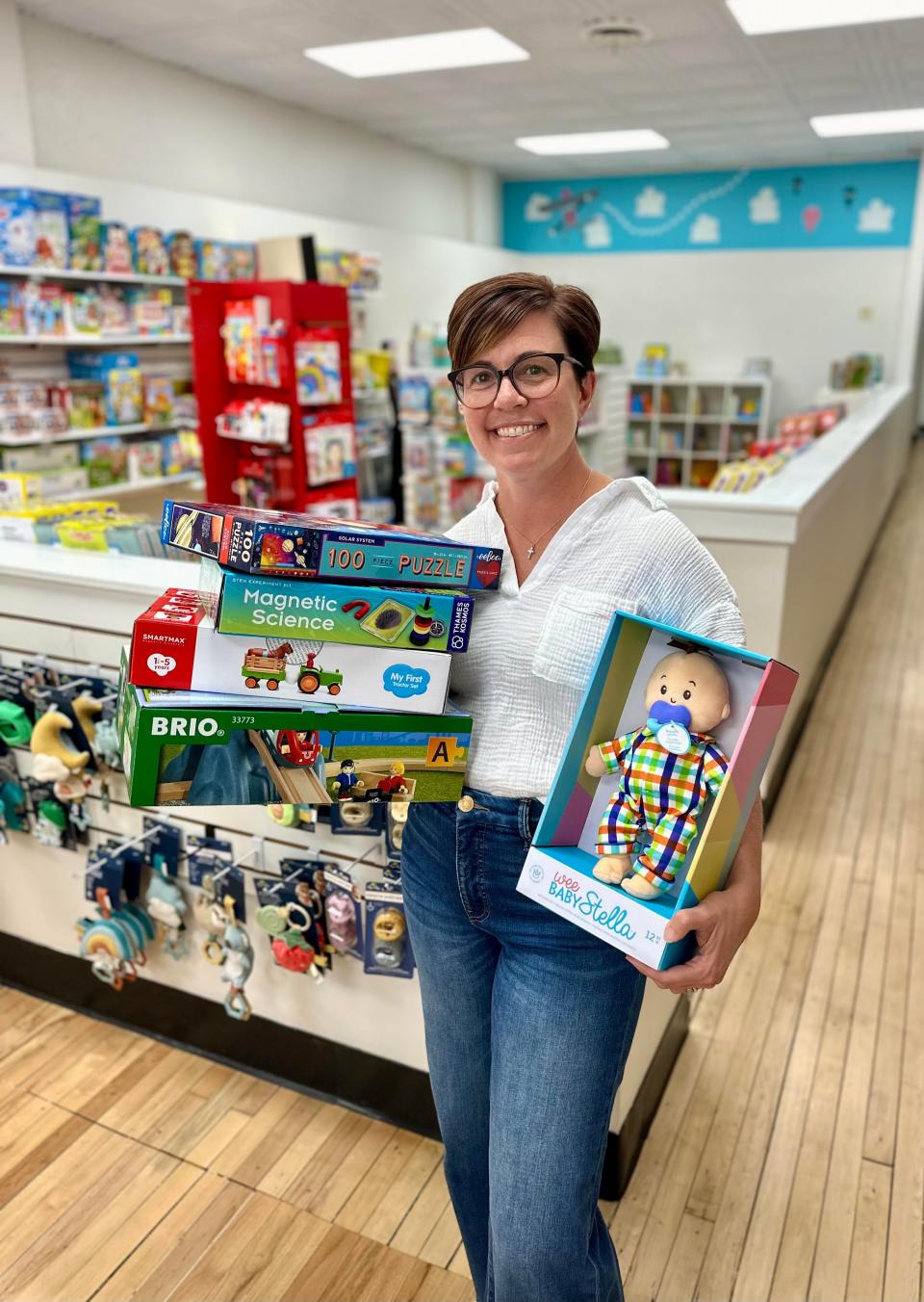 Former teacher Lindsey Henry and her husband, Luke, opened LuLu's Toy Co in 2022 in downtown Marion. The specialty toy shop carries items not found in big box stores. (PHOTO PROVIDED BY LUKE HENRY)