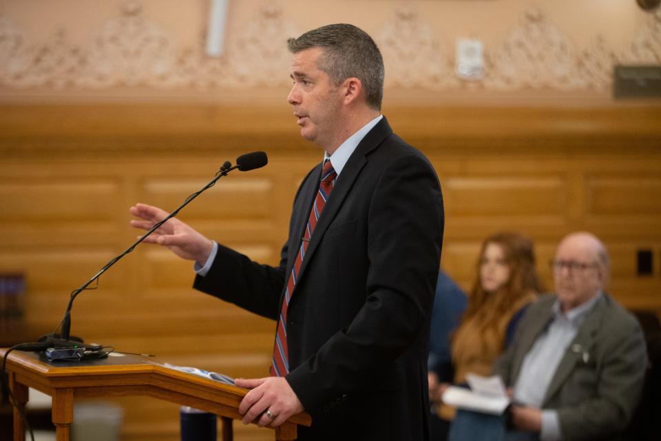 Budget director Adam Proffitt answers question on education funding posed by legislative members during Thursday's House Appropriations Committee hearing.