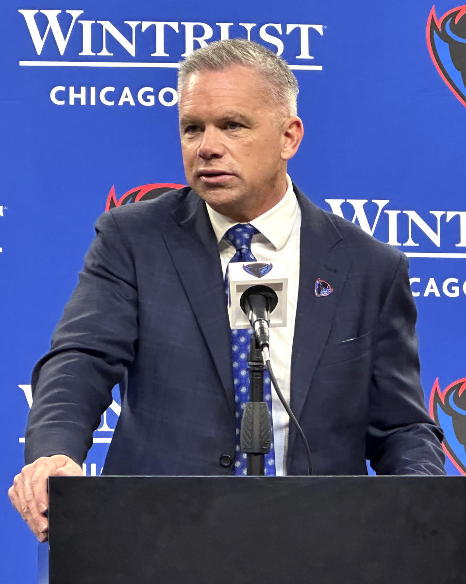 Chris Holtmann speaks after being introduced as the new NCAA college basketball head coach at DePaul University in Chicago Monday, March 18, 2024. (AP Photo/Andrew Seligman)