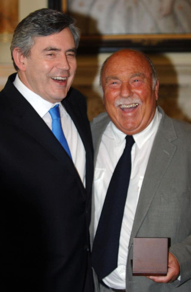 Jimmy Greaves (right) smiles after collecting his World Cup winners medal 