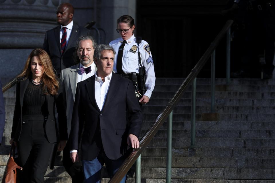 Michael Cohen leaves New York State Supreme Court after testifying in the civil fraud trial on 25 October. (REUTERS)