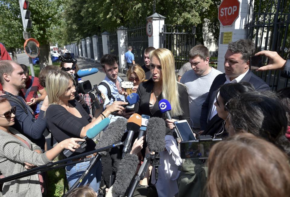 The physician treating Russian opposition leader Alexei Navalny, Dr. Anastasiya Vasilyeva speaks to journalists at a hospital after Navalny was discharged, in Moscow, Russia, Monday, July 29, 2019. Vasilyeva said that Navalny, who had been taken to the hospital with a severe allergy attack, has been discharged after his condition improved, but expressed concern that he was discharged before test results were available, after previously asserting he may have been poisoned. (AP Photo)
