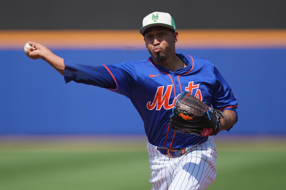 New York Mets relief pitcher Edwin Diaz (39) warms-up in the seventh inning against the Miami Marlins at Clover Park on March 17, 2024, in Port St. Lucie, Fla.