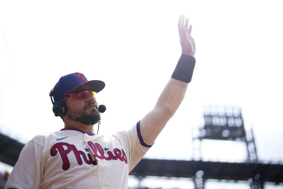 Philadelphia Phillies' Kyle Schwarber waves after the Phillies won a baseball game against the Kansas City Royals, Sunday, Aug. 6, 2023, in Philadelphia. (AP Photo/Matt Slocum)