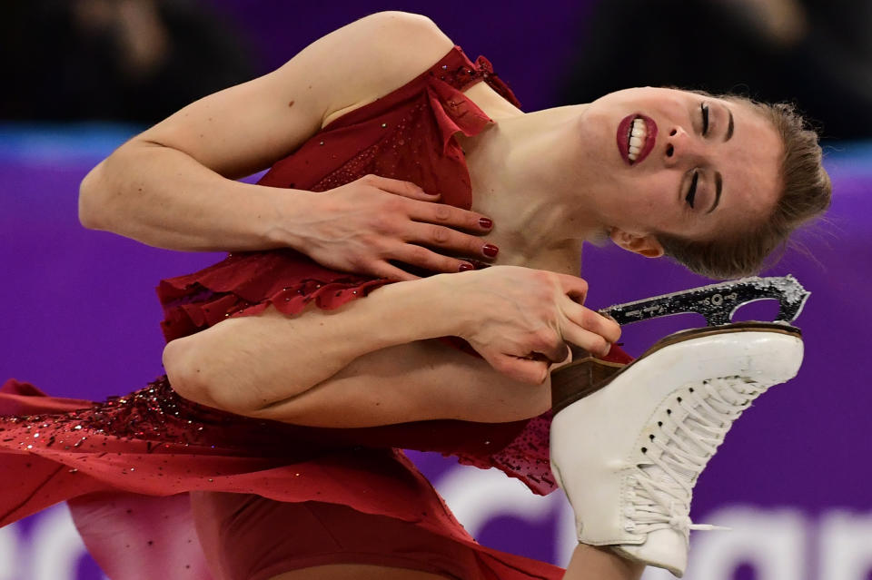 <p>Italy’s Carolina Kostner competes in the women’s single skating short program of the figure skating event during the Pyeongchang 2018 Winter Olympic Games at the Gangneung Ice Arena in Gangneung on February 21, 2018. / AFP PHOTO / Roberto SCHMIDT </p>